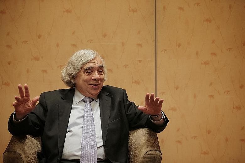 Leading energy specialist Ernest Moniz, who was speaking to The Sunday Times on Thursday on the sidelines of the Ecosperity Conference, called for closer cooperation among Asean nations to reach low-carbon goals. ST PHOTO: JASON QUAH
