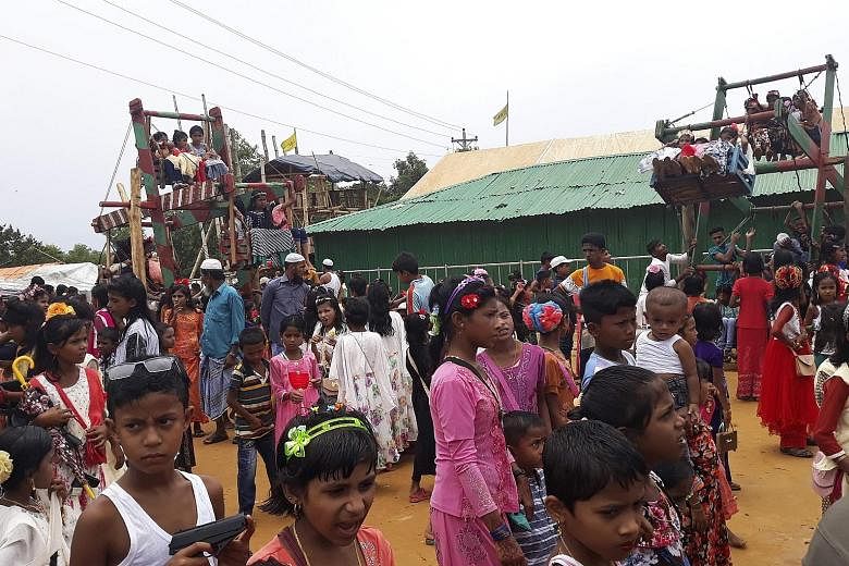 Rohingya refugees celebrating the Eid Al-Fitr festival last Wednesday at a camp near Cox's Bazar in Bangladesh. The leaked report gives a glowing assessment of Myanmar's efforts to entice the refugees back from Bangladesh, where some 740,000 have tak