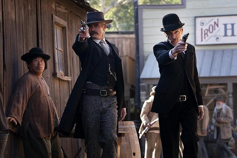 Ian McShane, John Hawkes (right) and Timothy Olyphant (left) star in Deadwood: The Movie.