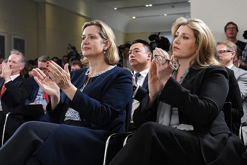 Britain's Work and Pensions Minister Amber Rudd (left) and Defence Minister Penny Mordaunt at the launch of Foreign Minister Jeremy Hunt's campaign to become the leader of the Conservative Party, in London yesterday.