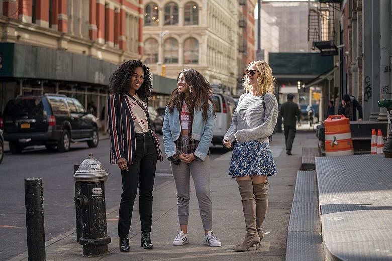 Three friends (from left, DeWanda Wise, Gina Rodriguez and Brittany Snow) learn to be comfortable with themselves in Someone Great.