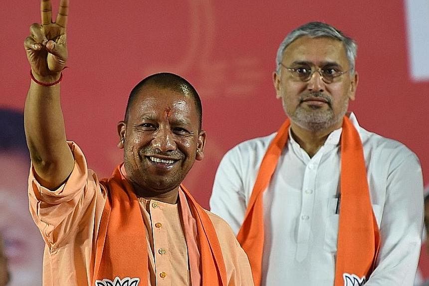 Mr Prashant Kanojia (left) was arrested for allegedly defaming Uttar Pradesh Chief Minister Yogi Adityanath (below). He had shared a tweet containing a video in which a woman said she had video chatted with Mr Adityanath for a year.