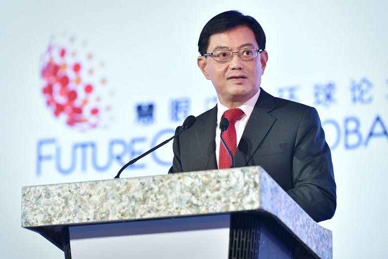 Only about 5 per cent of economic losses in Asia are insured, putting great strain on governments if a natural disaster strikes, says Mr Heng Swee Keat.