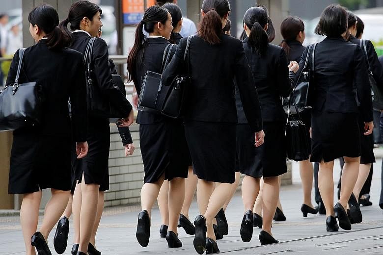 Ms Yumi Ishikawa, the figurehead of Japan's #KuToo movement, presented Health Minister Takumi Nemoto with a petition of 21,000 signatures last week, calling for a ban on high-heel stipulations by employers. The movement's name is a triple pun on the 