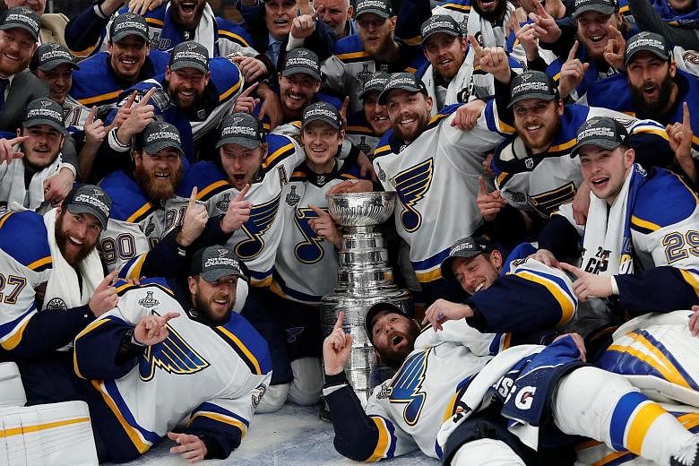 St Louis Blues players posing with the Stanley Cup after defeating the Boston Bruins 4-1 in the deciding Game 7 of the 2019 Finals at TD Garden on Wednesday. Rookie goalkeeper Jordan Binnington made 32 saves as the Blues ended a 52-year drought, the 