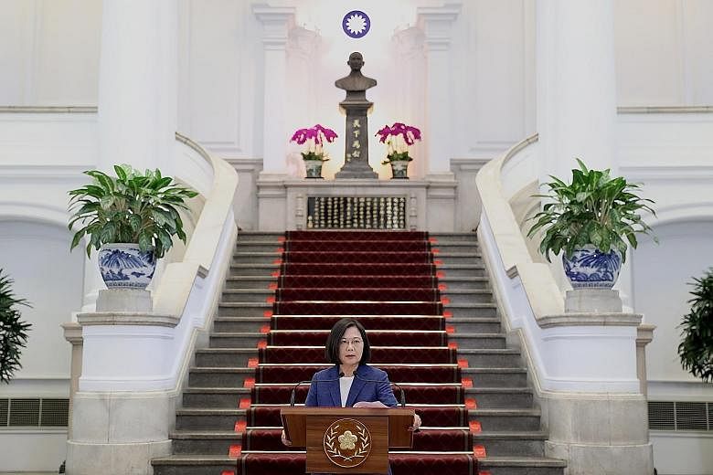 Taiwan's President Tsai Ing-wen at a press briefing in Taipei yesterday. She is aiming to avoid becoming Taiwan's first one-term president when the island goes to the polls in January. PHOTO: EPA-EFE