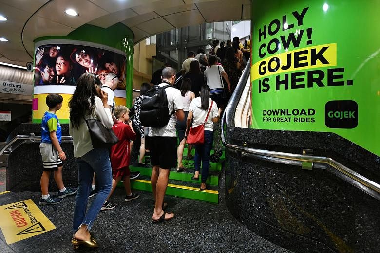 Ride-hailing company Gojek has its headquarters in Indonesia, while DBS has more than 460,000 digibank customers in the country to date. ST PHOTO: LIM YAOHUI