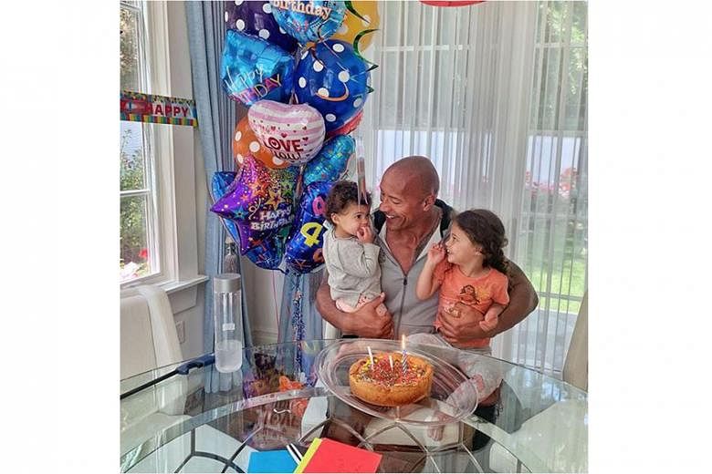 THE ROCK BLASTED OVER DAUGHTER'S PHOTO: Netizens are throwing "rocks" at Dwayne Johnson after he recently posted a photo of himself and his daughter at a swimming pool. 	Three-year-old Jasmine was not in a swimsuit, prompting some to question the act