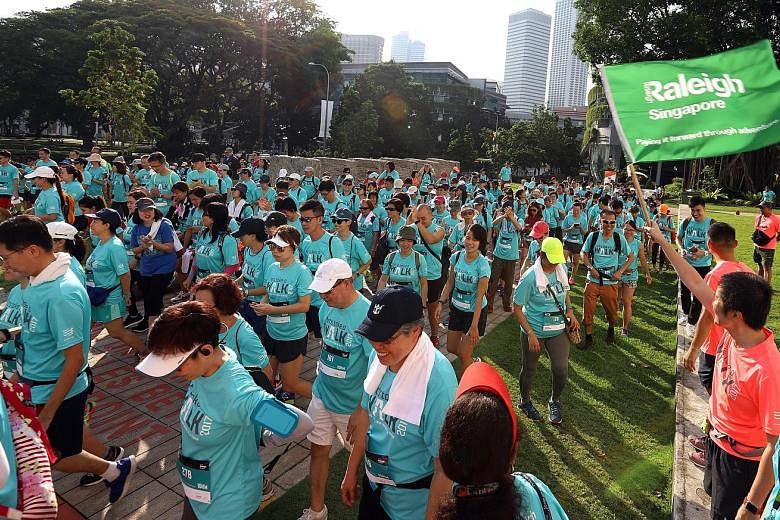 Participants at the biennial Let's Take A Walk event in 2017. For this year's edition coming up in November, organiser Raleigh Singapore is hoping to raise $150,000 through registration fees and pledges.