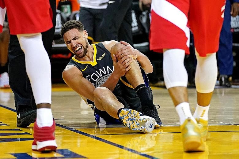 Golden State guard Klay Thompson going down in pain after landing awkwardly in the third quarter of their 114-110 loss to the Toronto Raptors in Game 6 of the NBA Finals. He suffered a torn anterior cruciate ligament in what was the team's final game