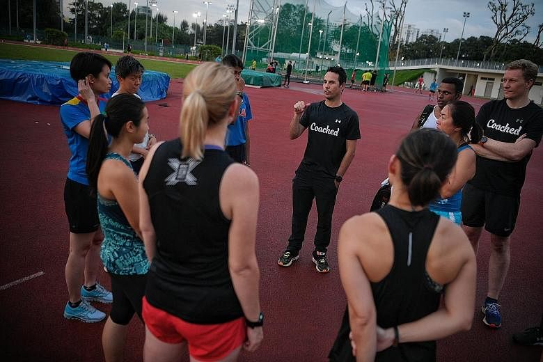 Former professional triathlete Ben Pulham (centre, during a recent training session) will be helming The Straits Times Run's coaching series this year. 
