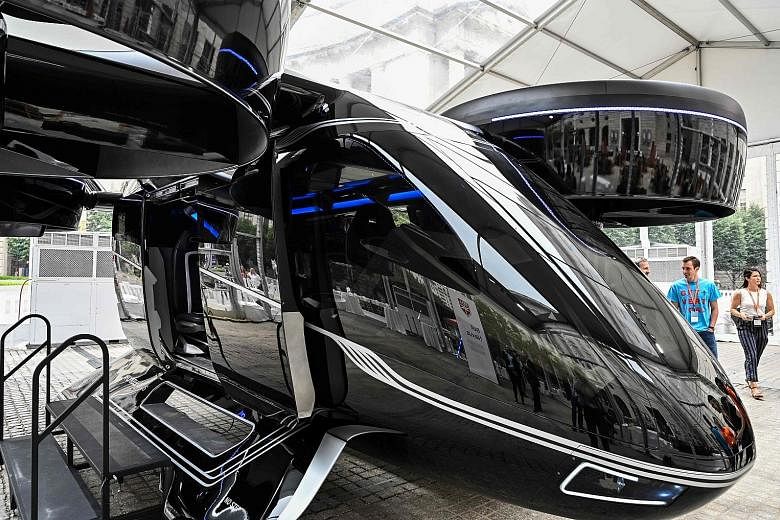 The Bell Nexus concept vehicle - one of the flying cars that will be part of Uber's fleet for aerial ride sharing, expected to launch in 2023 - at the Uber Elevate Summit in Washington last week. Technology will have to advance a long way before auto