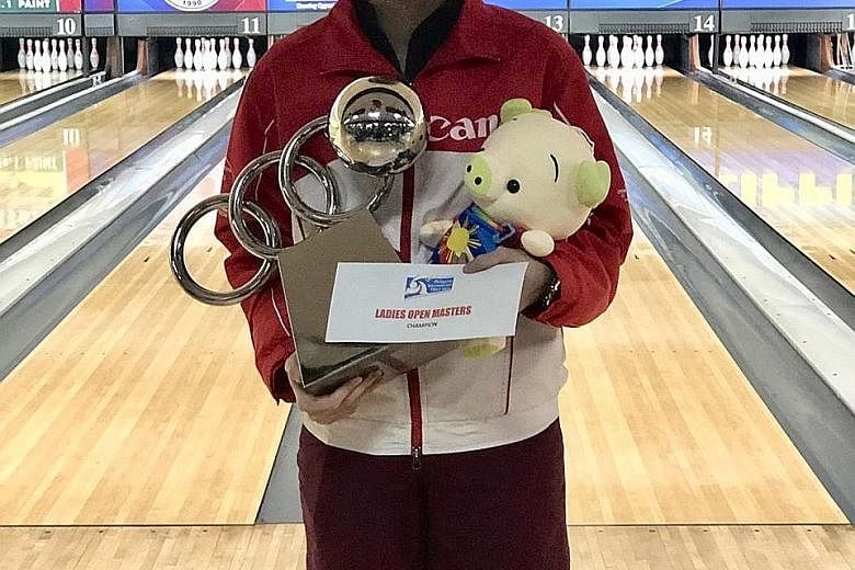 National training squad bowler Amabel Chua is all smiles after winning her first international title in Manila on Saturday. PHOTO: SINGAPORE BOWLING FEDERATION