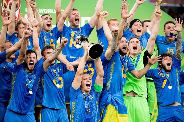 Ukrainian players celebrating after beating South Korea 3-1 in the final to lift the Fifa Under-20 World Cup in Lodz, Poland, on Saturday. Vladyslav Supriaha was the star for Ukraine, the 19-year-old Dynamo Kiev player scoring twice as his country wo