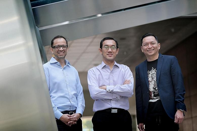 From left: MetLife Asia chief innovation officer and LumenLab chief executive Zia Zaman, SPH chief of digital business Julian Tan and NTUC Income chief operating officer Peter Tay.