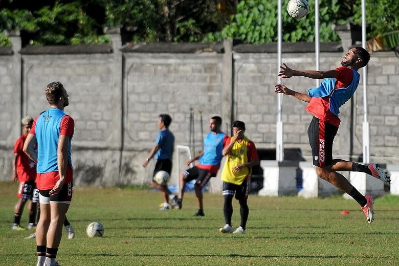 Bali United players training in Bali yesterday. Some of the team's new shareholders are its supporters, who snapped up nearly a third of the shares, primarily in small holdings.