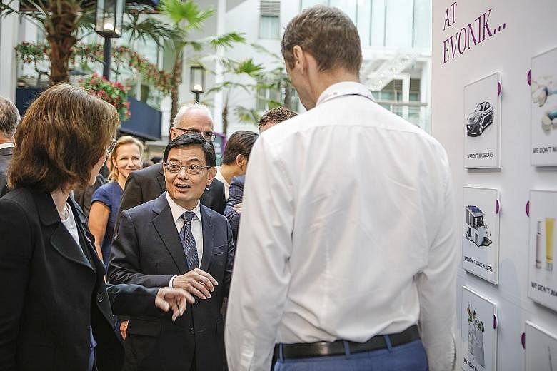 Deputy Prime Minister Heng Swee Keat at the launch of Evonik Industries' new facility yesterday. The new methionine plant on Jurong Island creates more than 100 jobs in Singapore.