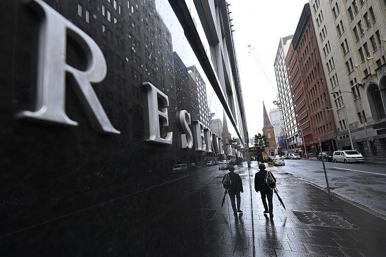 The Reserve Bank of Australia cut interest rates for the first time in three years earlier this month. It lowered its cash rate by 25 basis points to 1.25 per cent. PHOTO: AGENCE FRANCE-PRESSE