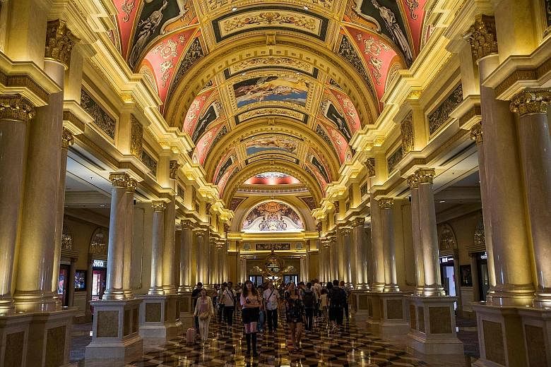 Mr Ho Iat Seng, who is the main contender in the Macau elections, is Beijing's favoured candidate, say industry experts. Visitors at The Venetian casino resort in Macau, the world's biggest gambling hub. The chief executive that Macau chooses in the 