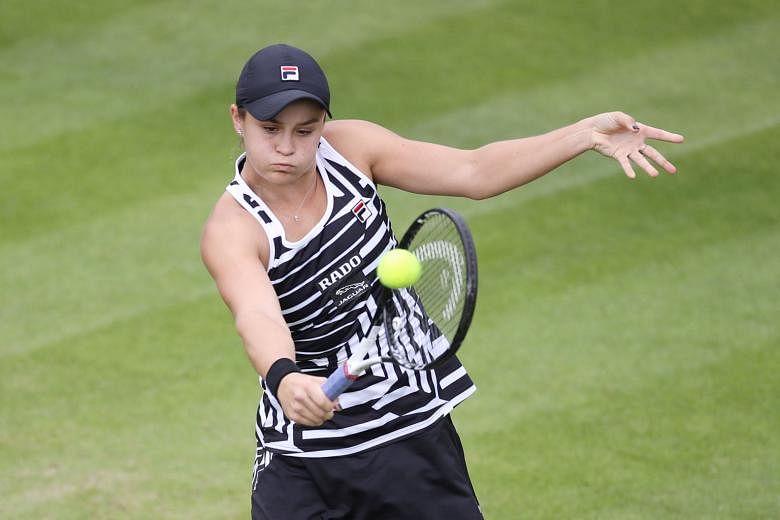Ashleigh Barty on the way to beating Donna Vekic in the second round of the Birmingham Classic yesterday. The Australian world No. 2 will be among the favourites at Wimbledon next month.