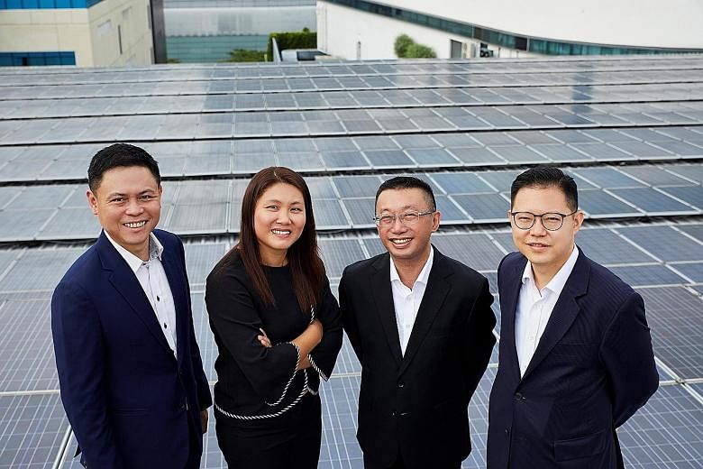 (From far left) Mr Lawrence Wu, Sunseap's president and executive director; Ms Lilian Foo, Sakae Holdings' chief executive and executive director; Mr Choo Kee Siong, UOB's head of industry groups, group commercial banking; and Mr Edmund Leong, UOB's 