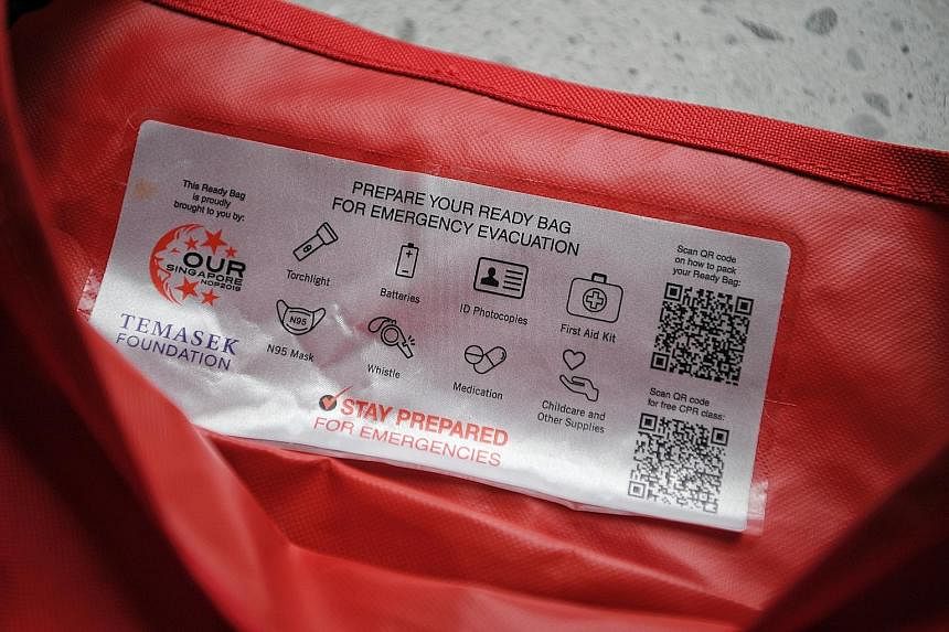 The bags come with a list of recommended essentials pasted on the inner flap (left) and can serve as "emergency-ready" bags.