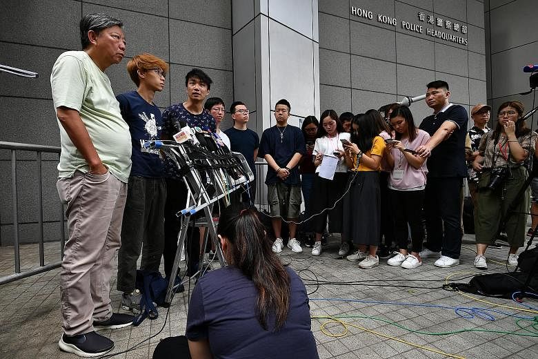 (From left) Hong Kong's Civil Human Rights Front representatives Lee Cheuk-yan, Figo Chan, Jimmy Sham and Wong Yik-mo holding a press conference before making an official complaint against the excessive use of force by the police against protesters o