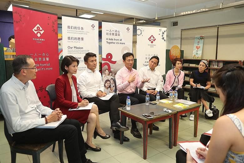 Education Minister Ong Ye Kung speaking to reporters on the sidelines of CDAC's annual general meeting yesterday. With him were (from left) CDAC executive director Pok Cheng Chong; Senior Parliamentary Secretary for Home Affairs and National Developm
