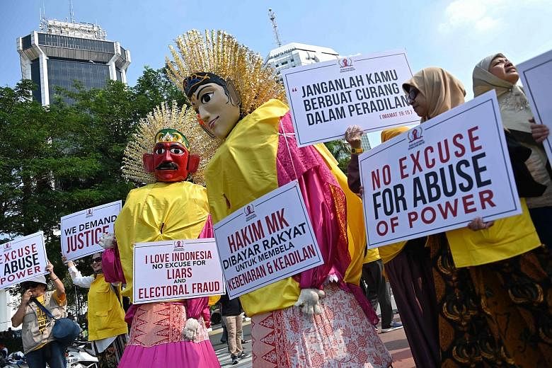 Protesters rallying near the Constitutional Court in Jakarta on Tuesday, the first day of hearing into claims by defeated presidential candidate Prabowo Subianto of vote-rigging.
