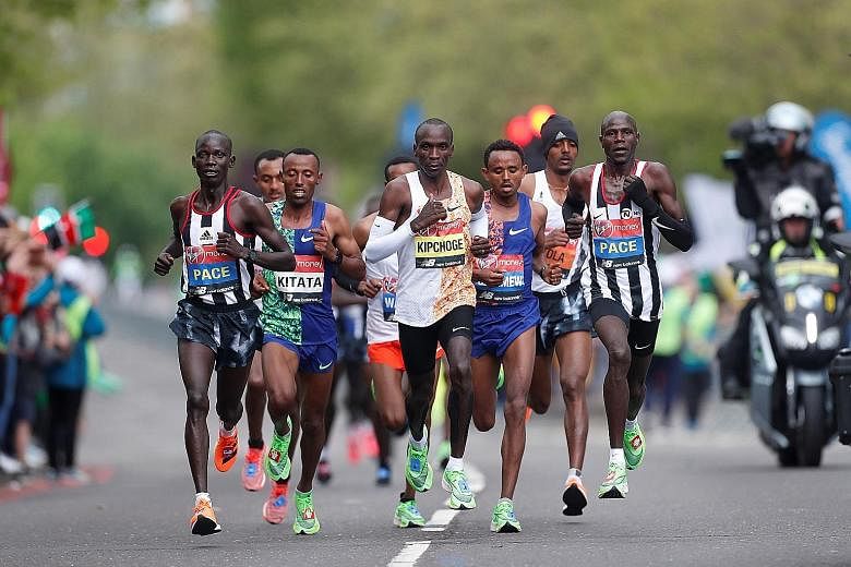 Kenyan Eliud Kipchoge (centre) may be fast but it could just be an easy effort for the marathon world-record holder. PHOTO: REUTERS
