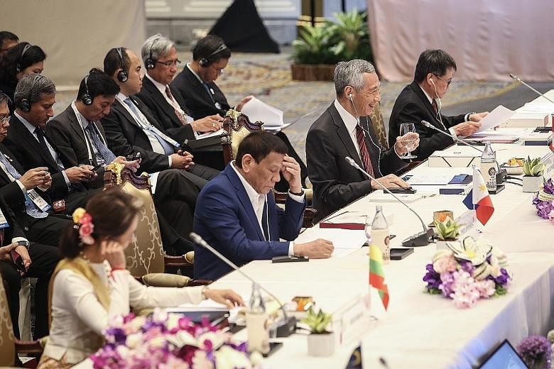 Prime Minister Lee Hsien Loong at the 34th Asean Summit Plenary Session in Bangkok yesterday. With him are (from left) Myanmar State Counsellor Aung San Suu Kyi, Philippine President Rodrigo Duterte and Asean Secretary-General Lim Jock Hoi. The Bangk