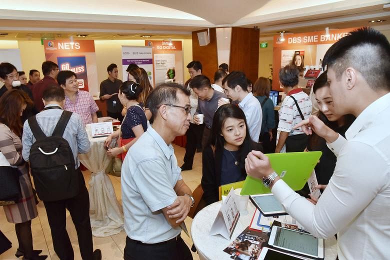 Participants networking at the Singapore Heartland Enterprise Seminar at Toa Payoh HDB Hub, where the official launch of the Heartland Enterprise Centre Singapore took place yesterday.