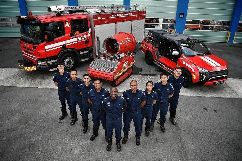 Among the firefighters who tackled last Friday's blaze at a Jalan Buroh liquefied petroleum gas facility were (from left) Corporal Thio Zheng Yang, Lance Corporal Muhammad Fazlan Rozali, Sergeant Ahmad Kafee Azman, Second Warrant Officer Syed Yazid S