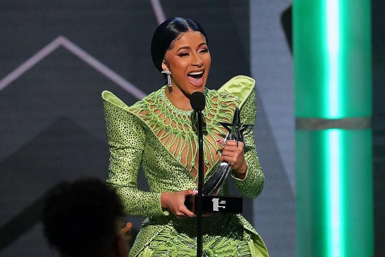 Rapper Cardi B received two trophies at this year's BET awards - Best Female Hip-hop Artist and Album Of The Year.