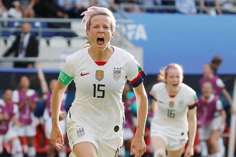 US captain Megan Rapinoe celebrates her second goal from the spot to down Spain 2-1. The defending champions will next face hosts France in the last eight. PHOTO: REUTERS