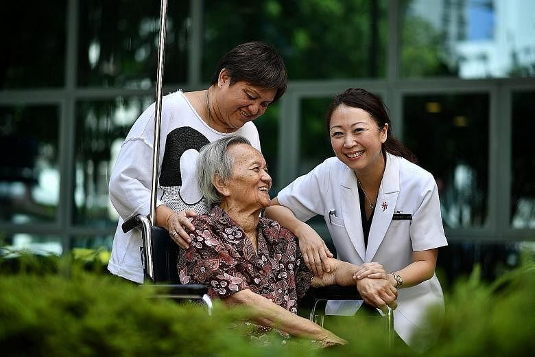 Madam Wee Ah Miow, with her daughter Annie Lim (left) and Dr Adeline Lam, made plans for her future care in 2017 after the new advance care planning system at Tan Tock Seng Hospital was up and running.