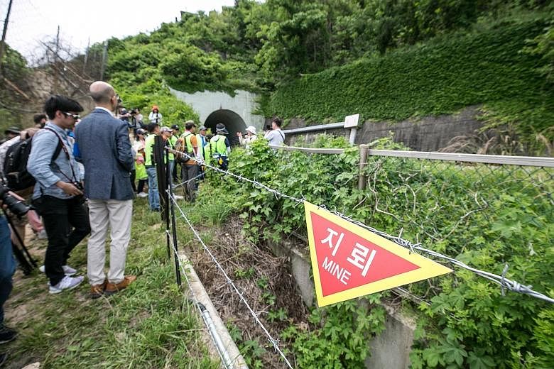 Tourists and members of the media visiting the South Korean side of the Demilitarised Zone separating the two Koreas earlier this month. PHOTO: BLOOMBERG