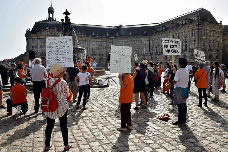 Protesters in Bordeaux, south-western France, demonstrating against the extension of compulsory vaccinations for young children. France's Parliament in 2017 passed a law increasing the number of vaccinations for children born after the beginning of l