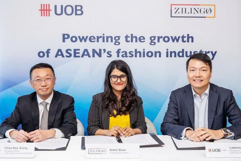 From left: Mr Choo Kee Siong, UOB's head of industry groups, group commercial banking, Zilingo's CEO and co-founder Ankiti Bose, and UOB's head of group business banking Lawrence Loh at yesterday's signing of the deal meant to help drive the growth o