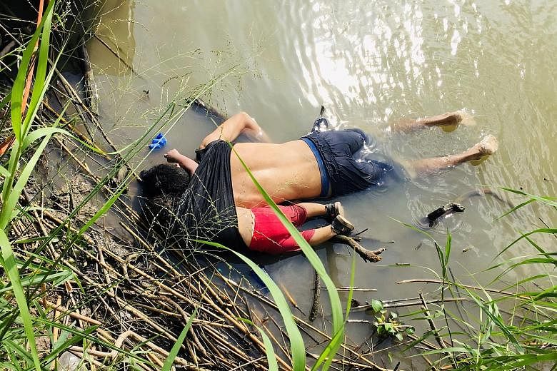 The bodies of Salvadoran migrant Oscar Alberto Martinez Ramirez and his nearly two-year-old daughter Valeria lying on the bank of the Rio Grande river in Matamoros, Mexico, on Monday after they drowned trying to cross the river to Brownsville, Texas.