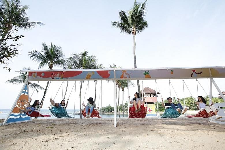 A 30m-long series of swings has been set up along Palawan Beach on Sentosa as part of the Make Time campaign to encourage people to take breaks. PHOTO: SENTOSA DEVELOPMENT CORPORATION
