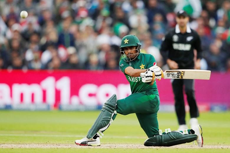 Pakistan's Babar Azam hitting a four at Edgbaston, Birmingham on Wednesday. His 101 not out was instrumental in the team chasing down New Zealand with five balls remaining. PHOTO: REUTERS
