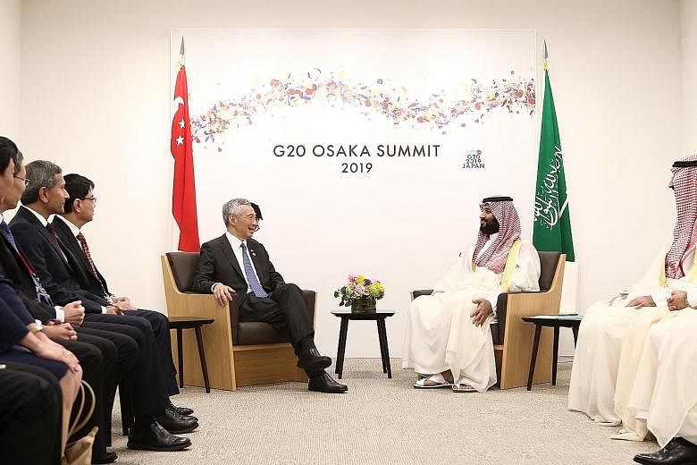 Prime Minister Lee Hsien Loong meeting Saudi Arabia's Crown Prince Mohammad Bin Salman yesterday on the sidelines of the Group of 20 Leaders' Summit in Osaka. PM Lee expressed hope that more Singaporeans will be allowed to perform the annual haj pilg