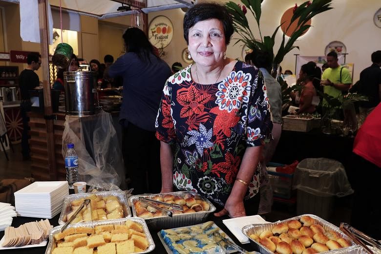 Madam Mary Gomes of Mary's Kafe, with kueh which will be available during the Kueh Appreciation Day on July 28.