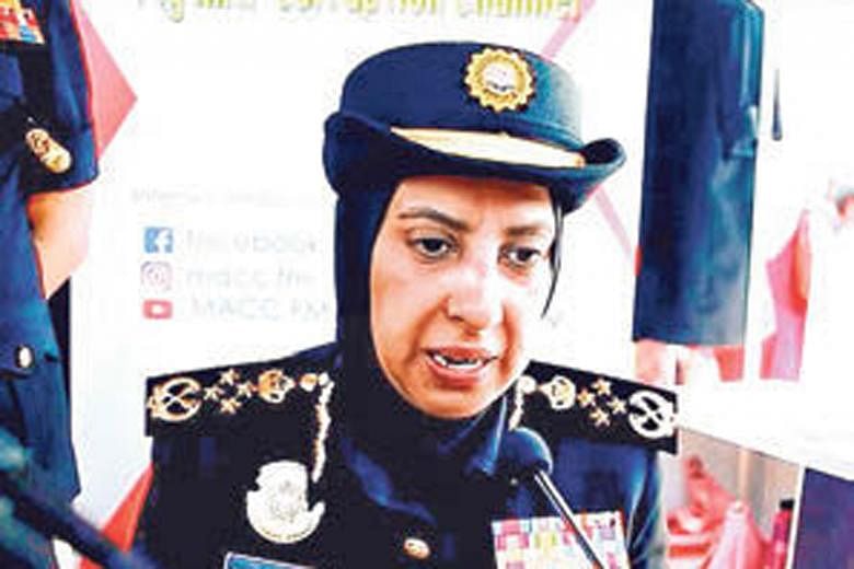 Responding to an Umno leader's comment on the "many stars and medals" on her uniform, Ms Latheefa Koya said they are not medals but bar ribbons and "rank badges" she must wear as chief commissioner. PHOTO: MACC TUBE