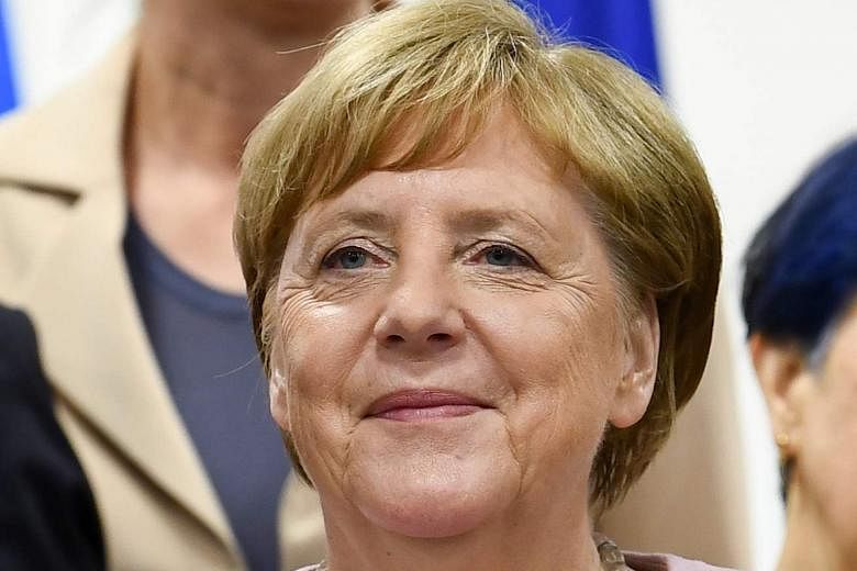 German Chancellor Angela Merkel has dismissed concerns over her health, saying that she felt fine.