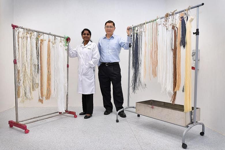 Dr Sowrirajalu Bhuvana (left), senior manager of technology with the Environmental and Water Technology Centre of Innovation at Ngee Ann Polytechnic, helped Firmbase's Pung Choong Theng develop a water membrane that does not clog up easily.