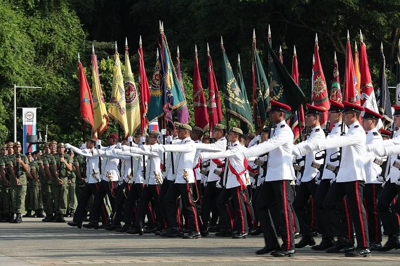 Yesterday's parade at Safti Military Institute saw over 3,000 servicemen reaffirming their commitment to Singapore's defence.