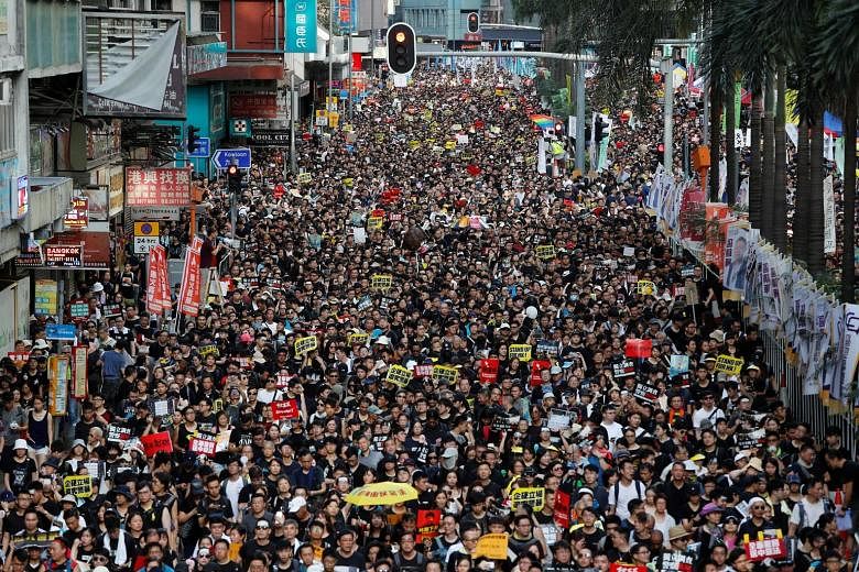 People thronging the streets of Hong Kong yesterday to protest peacefully against the controversial extradition Bill, on the anniversary of the city's return to China from British rule. Chinese Foreign Ministry spokesman Geng Shuang said yesterday th