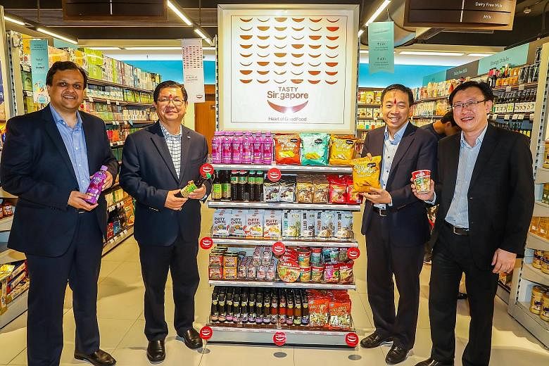 (From left) Foodhall chief operating officer Jay Jhaveri, Singapore Food Manufacturers' Association president David Tan, Enterprise Singapore chief executive Png Cheong Boon and Enterprise Singapore global markets director for South Asia Tay Lian Che